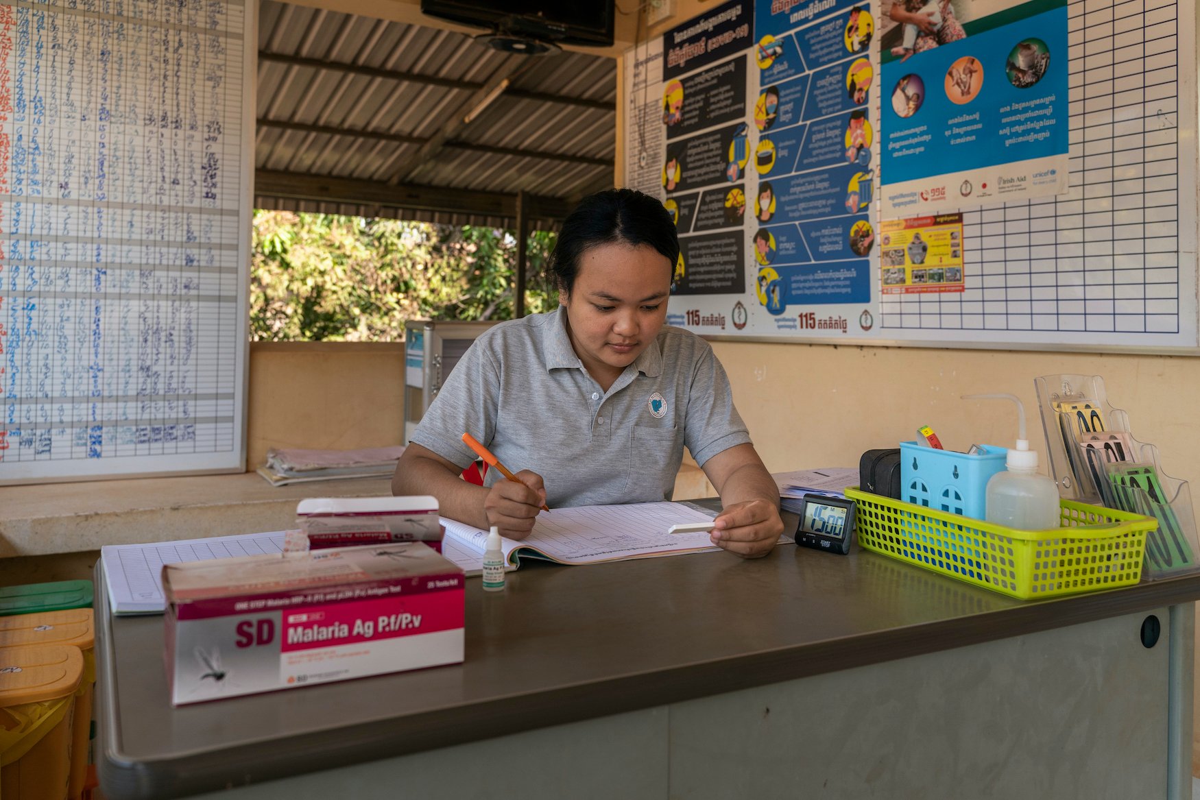 Cambodia: Portrait of Ly Kanha, midwife and health centre malaria worker