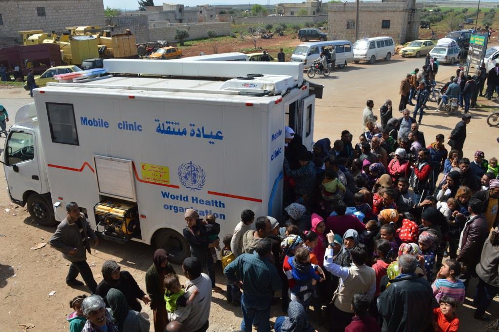 A mobile clinic provided to the Aleppo Directorate of Health provides care to children, women and men displaced from Afrin in March 2018.